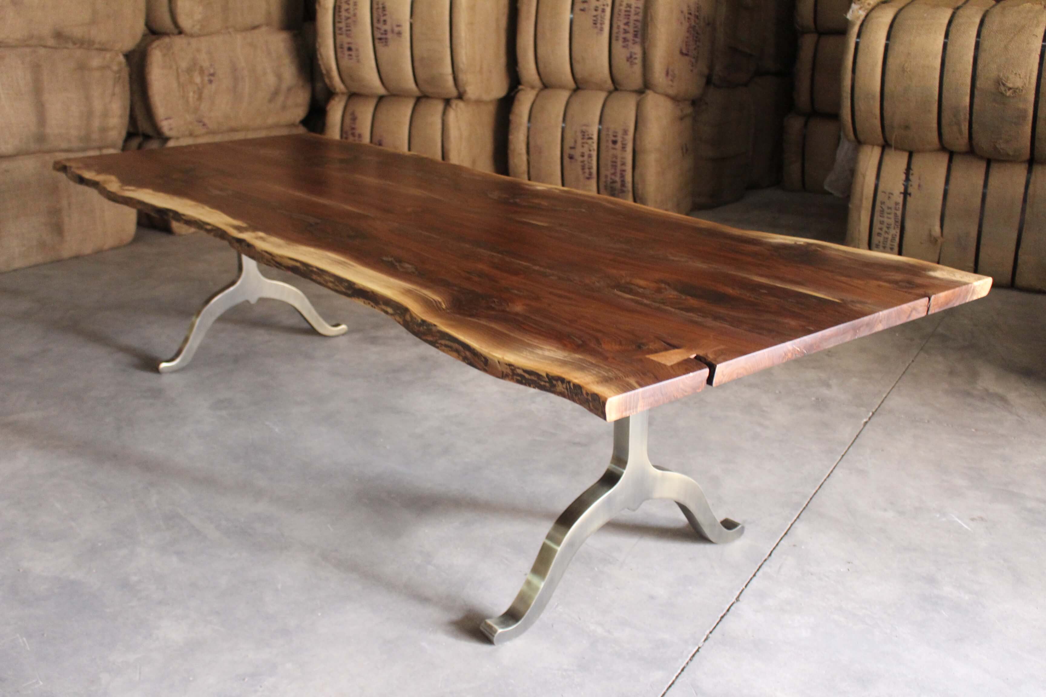 live edge black walnut dining table with antique brass base wishbone style sentient new york